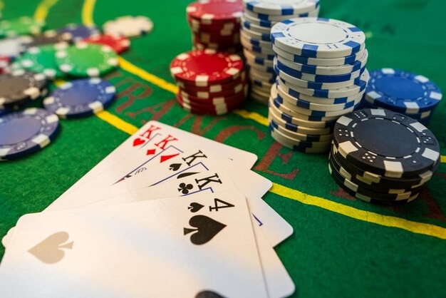 Live baccarat dealer and card table displayed on login cendanabet mobile screen